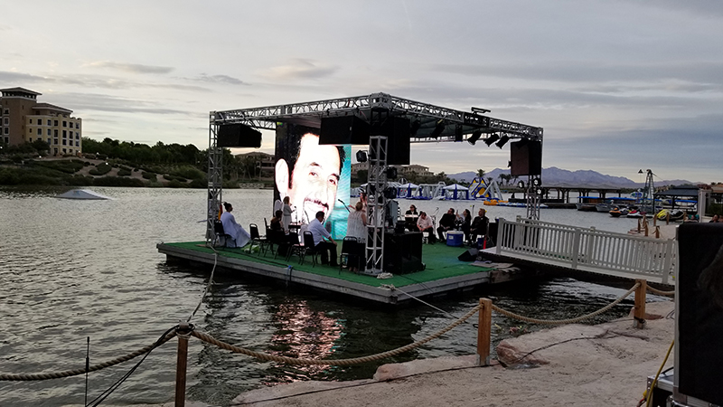 Outdoor LED Video Wall rental on the water at Beautiful Lake Las Vegas for an evening concert with Mrs Annie Meadows